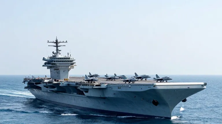 Illustration for: 21 Million Ballots Cast as Third Carrier Heads for Middle East